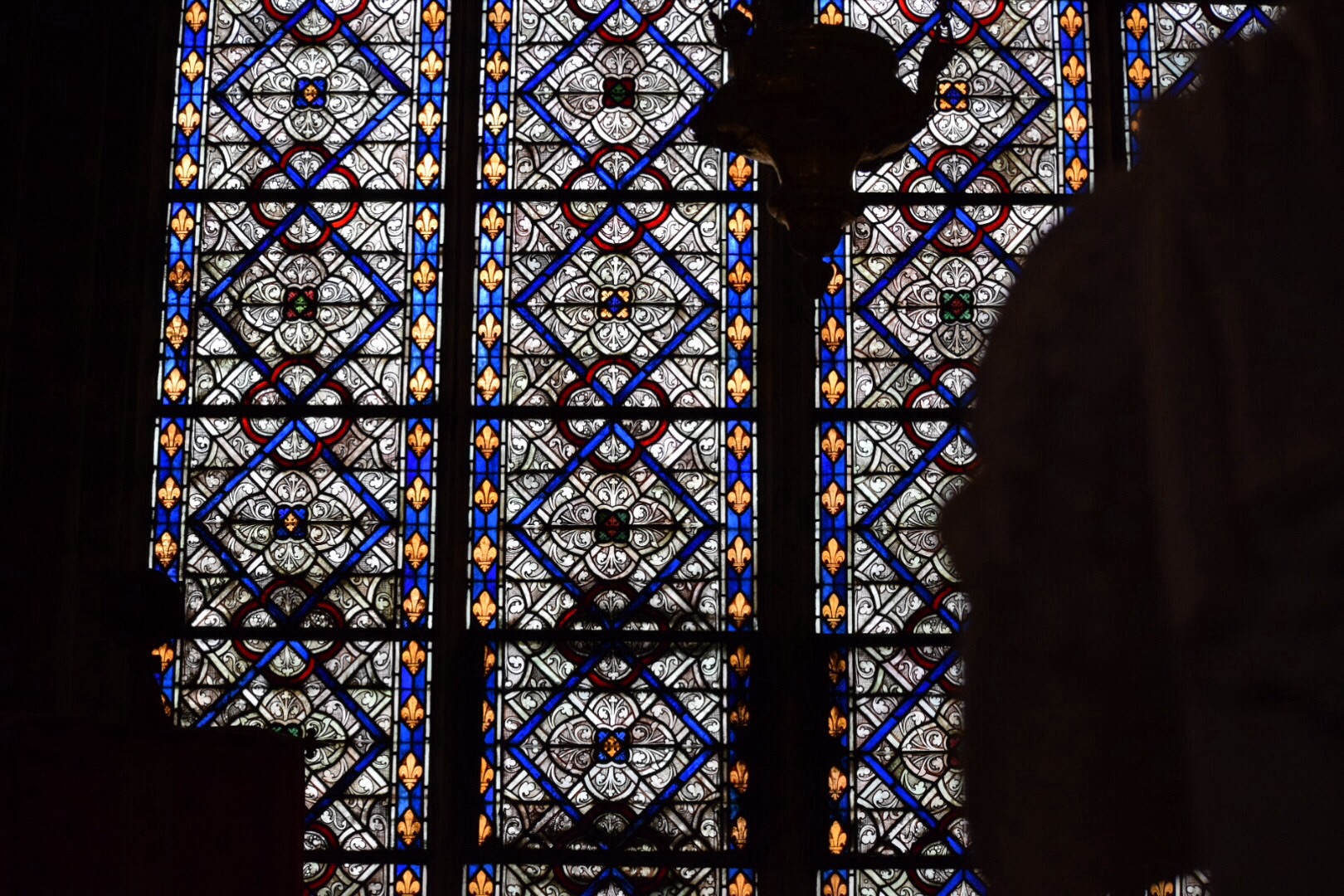 This yellow, red and blue stained glass provides inspiration from from Paris for quilters.  